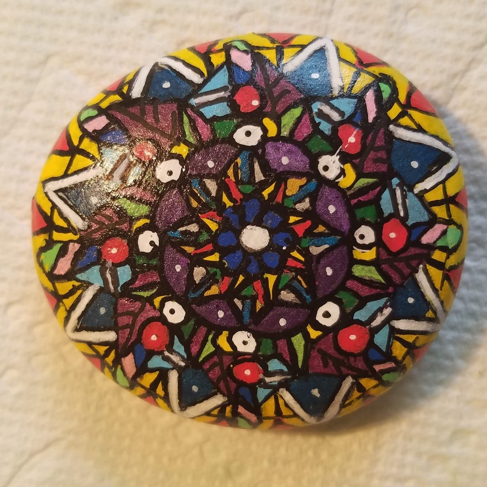 Hand-painted mancala rock